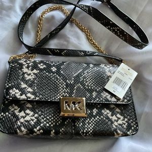 New Michael Kors hand bag, unused,